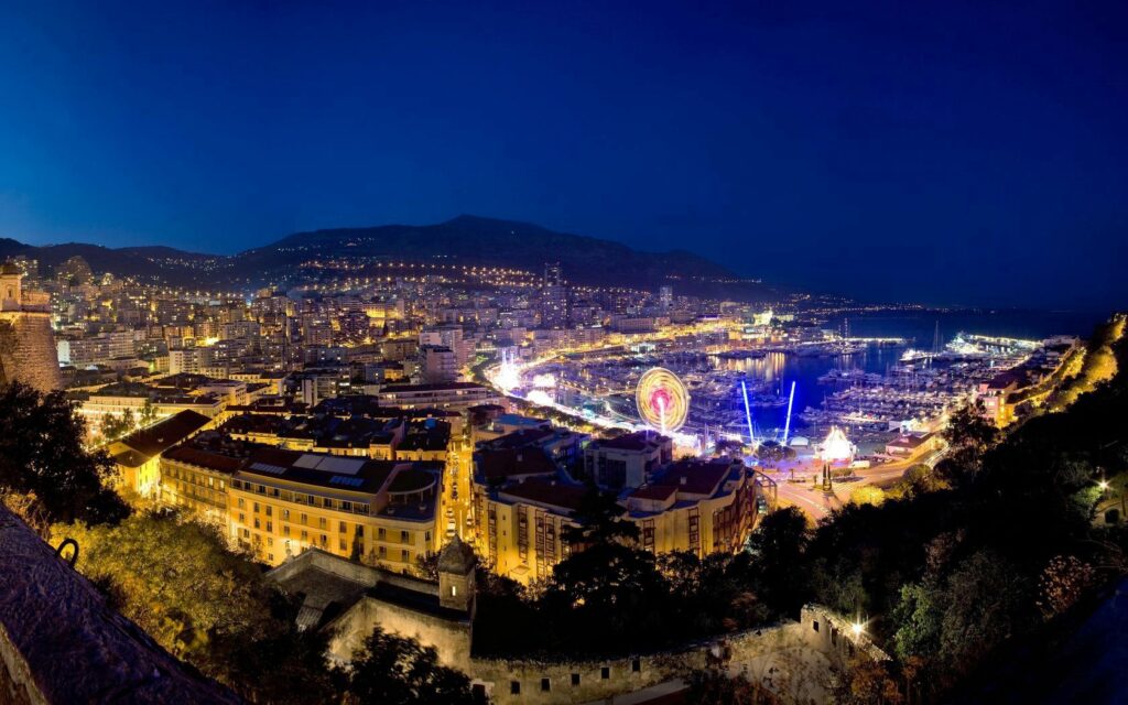 Stunning Monaco Nighttime Wallpaper: Illuminated Port & Cityscape