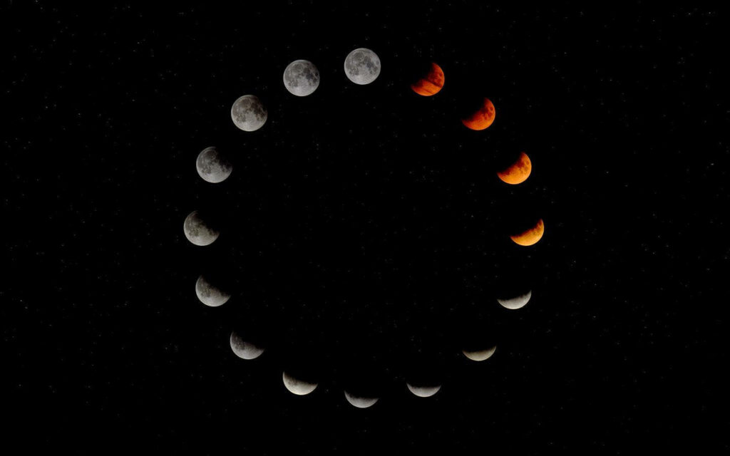 Stunning Moon Phases Wallpaper: Gray, Red, Orange on Starry Black