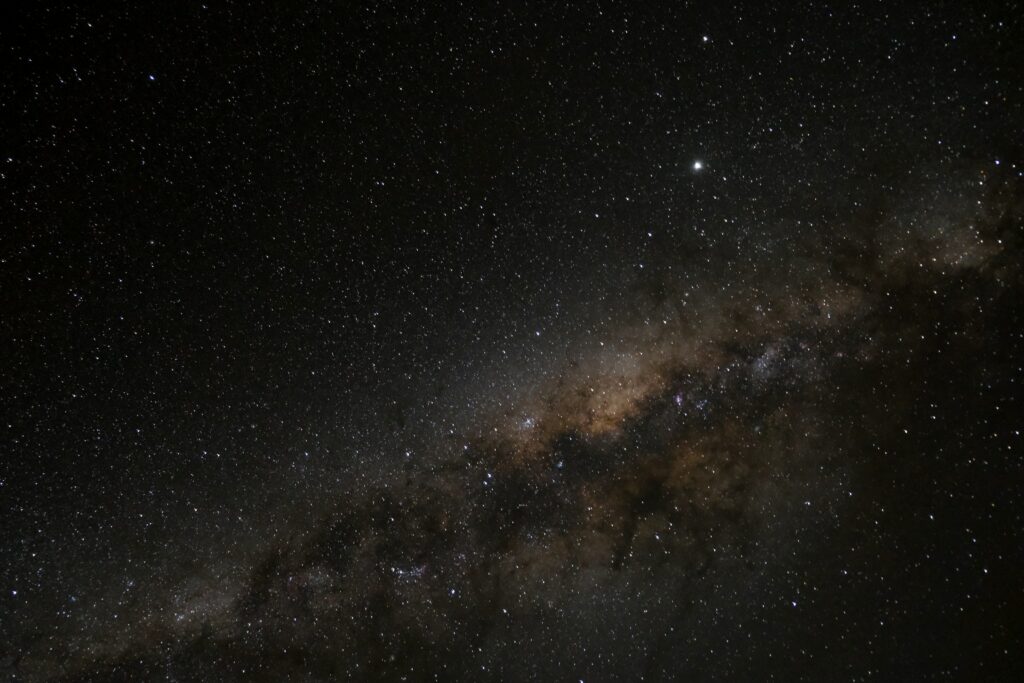 Mesmerizing Universe Wallpaper: Glowing Nebula & Starry Beauty