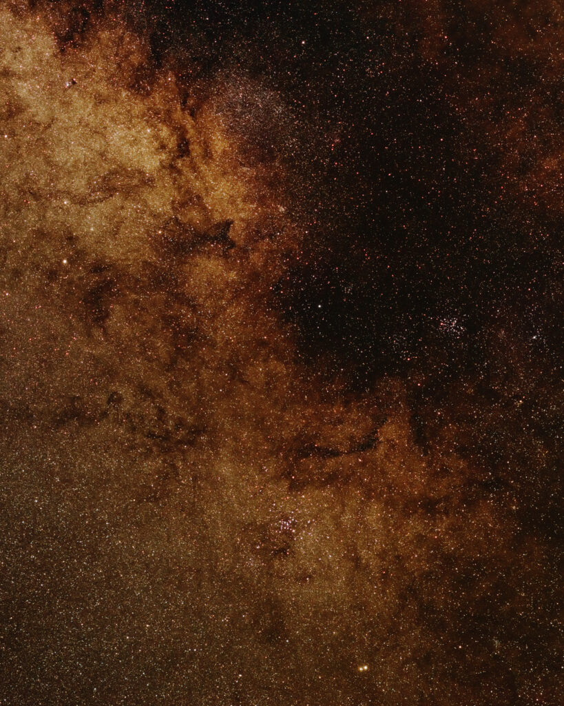 Mesmerizing Nebula Wallpaper: Brown & Gold Cosmic Beauty