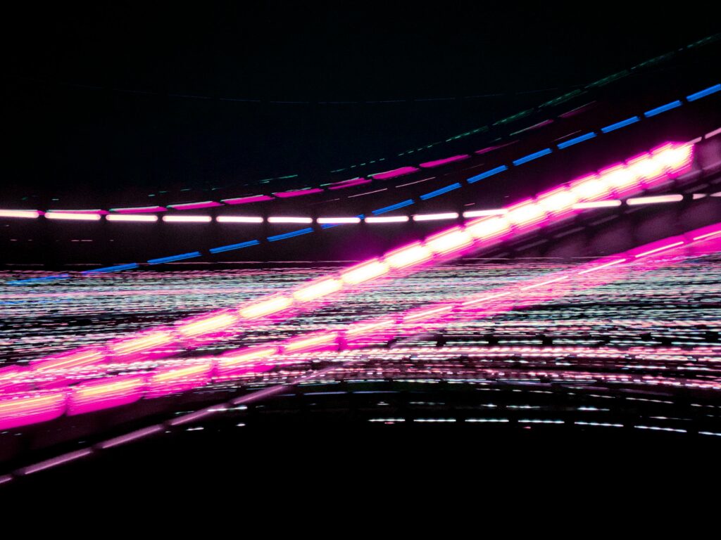 Neon Wave Wallpaper: Long Exposure Glow in Pink & Blue