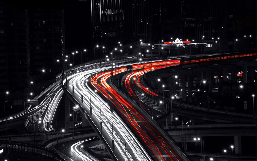 Mesmerizing Night View of a Busy City Highway - Stunning Wallpaper
