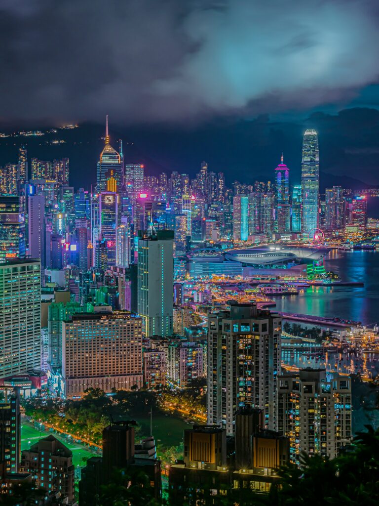 Nighttime Metropolis Wallpaper: Vibrant City Lights & Water Reflections