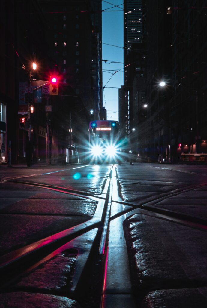 Mesmerizing Night Cityscape Wallpaper: Glowing Streets & Tram