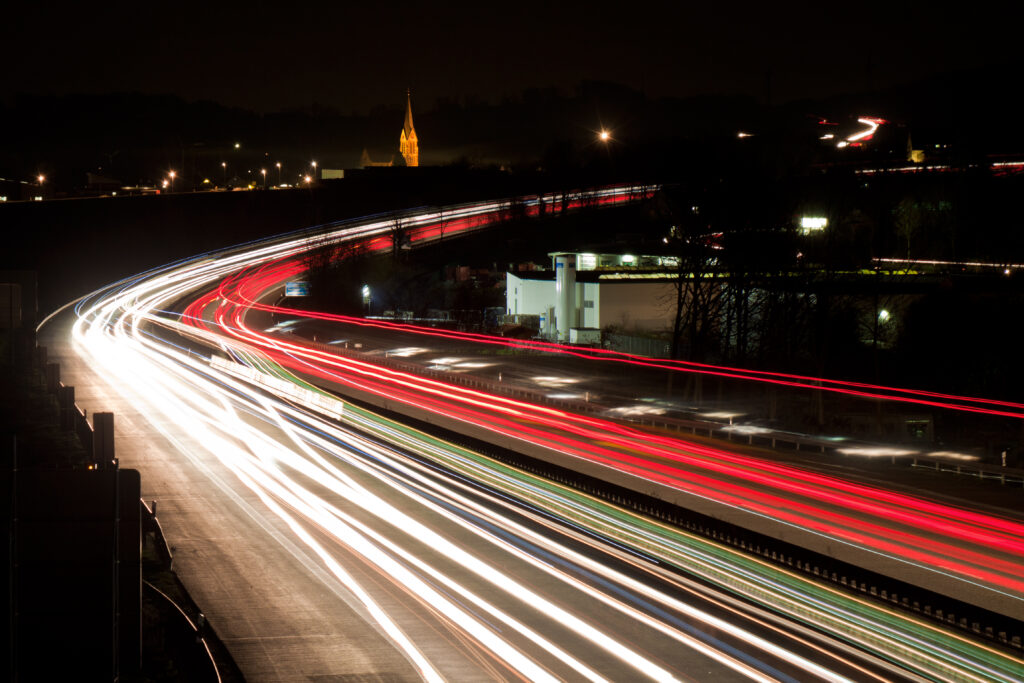Vibrant Night Road Wallpaper: Long-Exposure Light Trails