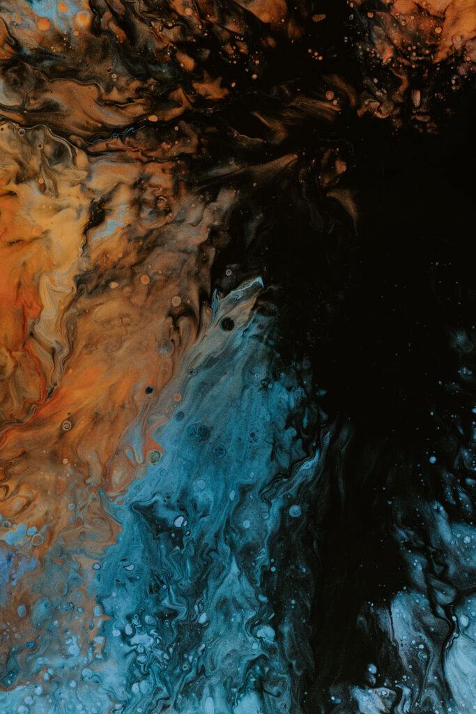 Dynamic Orange and Blue Swirls: Captivating Abstract Wallpaper