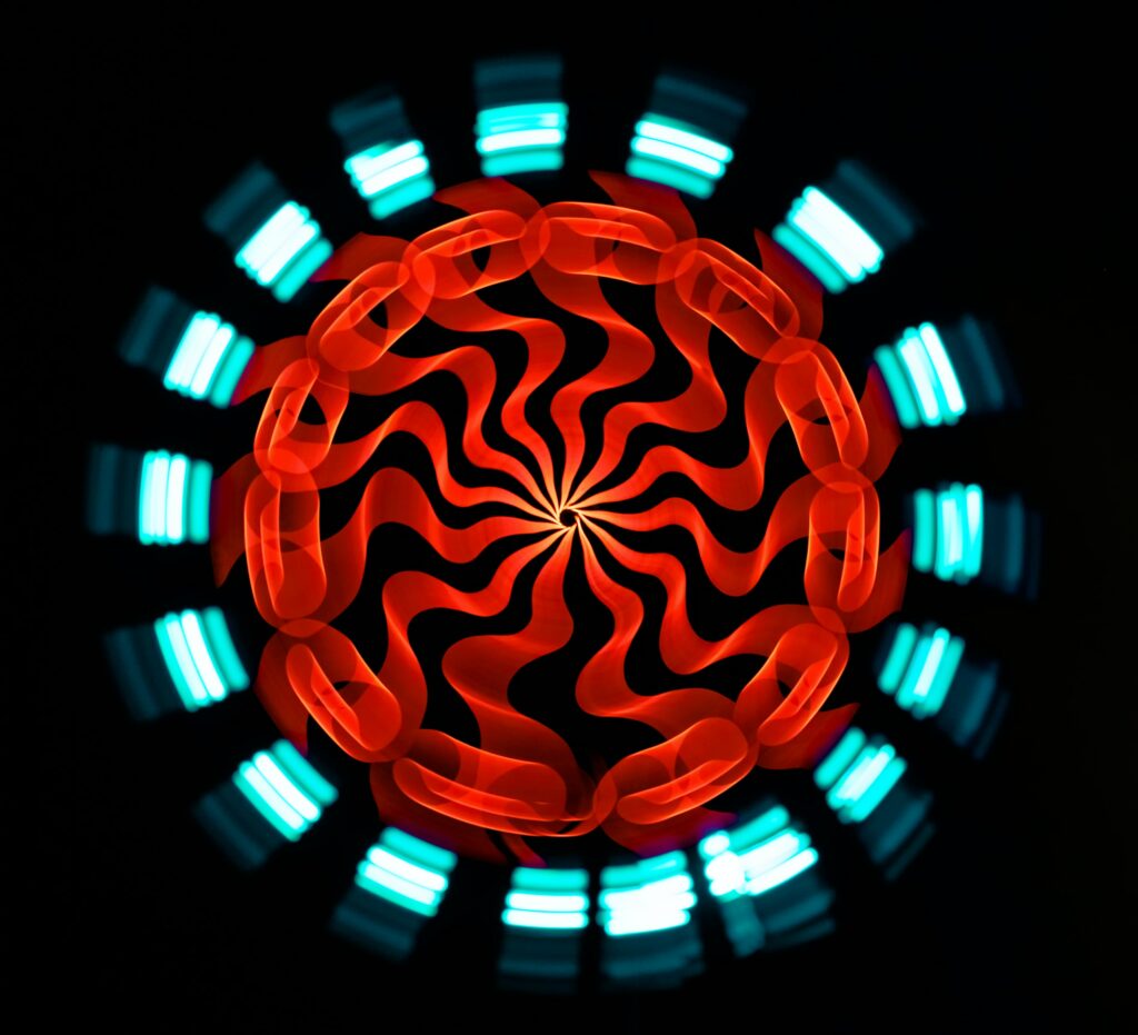 Ornamental Long Exposure Wallpaper | Radiant Red & Cyan Background