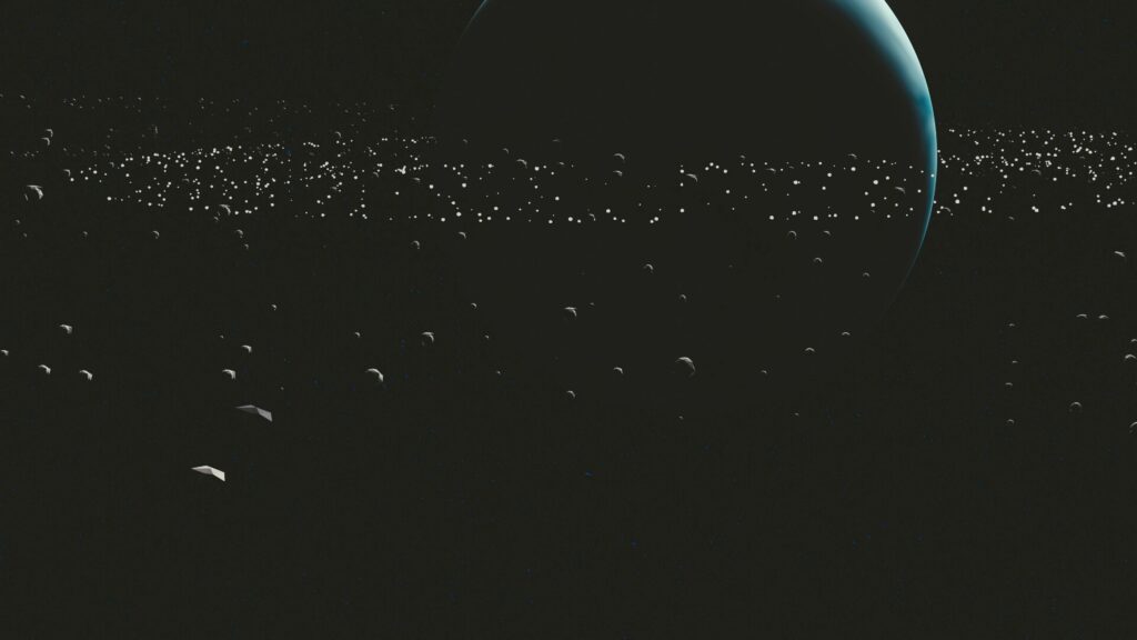 Mesmerizing Outer Space Wallpaper: Dark Planet & Glowing Asteroids