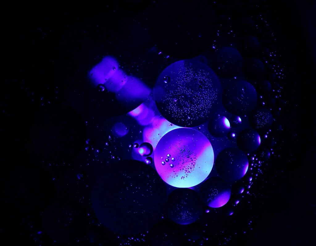 Mesmerizing Purple Bubble Wallpaper on Dark Background
