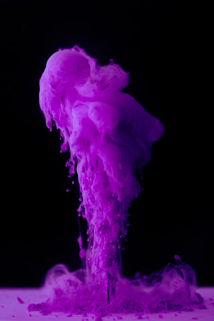 Mesmerizing Purple Ink Wallpaper: Abstract Fluid Art Background
