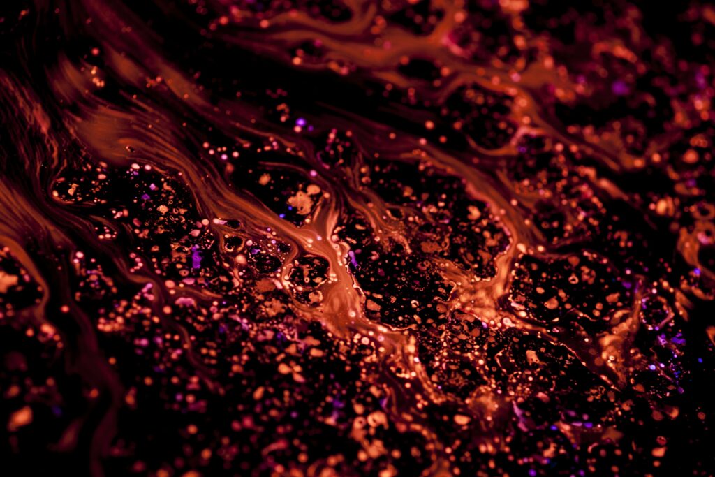 Mesmerizing Red Liquid Patterns Wallpaper Background - Macro Texture