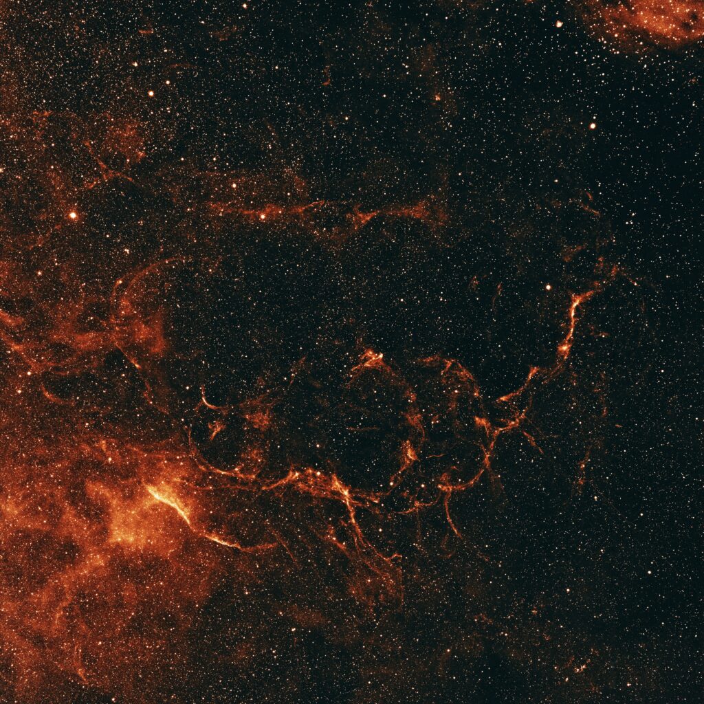 Mesmerizing Red Nebula Wallpaper: Stunning Celestial Background