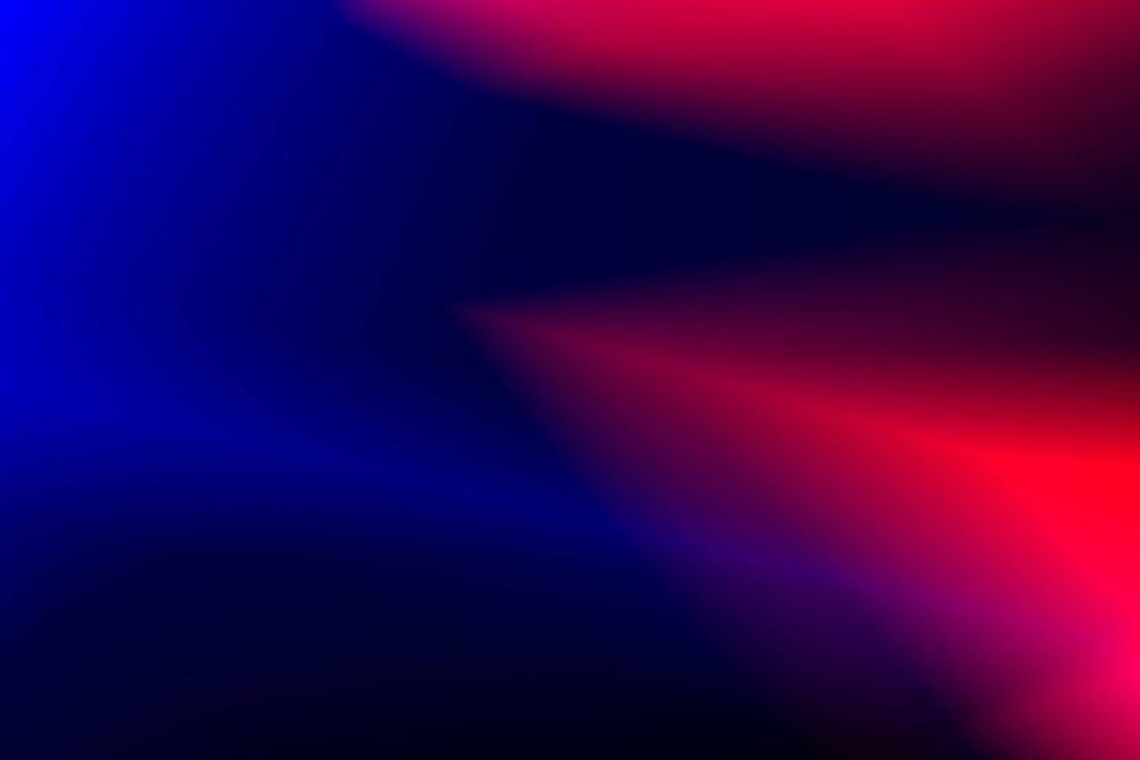 Mesmerizing abstract wallpaper with vibrant red and blue gradient blending into dark center