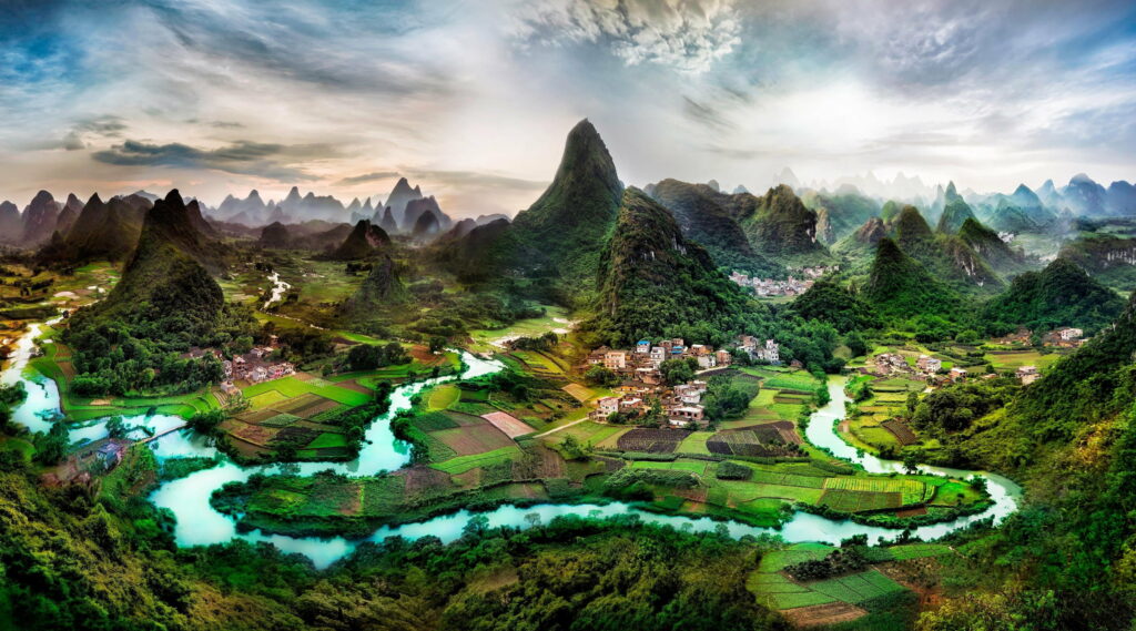 Guilin karst mountains with turquoise river lush fields and hillside villages 4K nature wallpaper