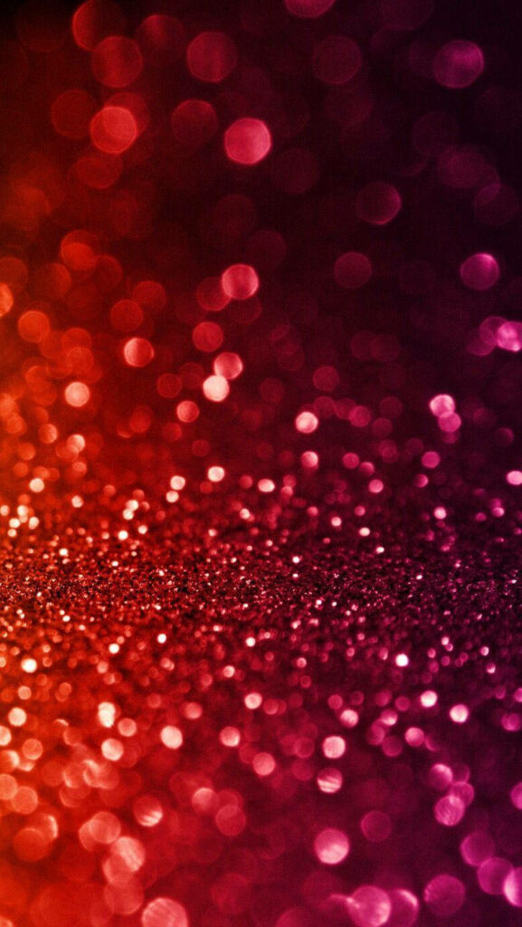 Enchanting Glitter Cascades: A Mesmerizing iPhone Wallpaper