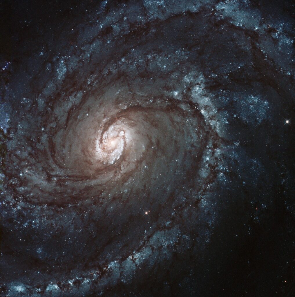 Mesmerizing Spiral Galaxy Wallpaper: Vibrant Cosmic Patterns