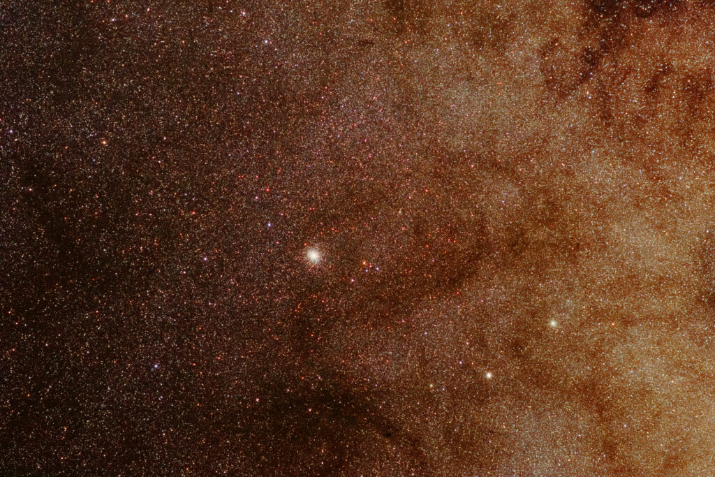 Mesmerizing Starry Sky Wallpaper with Glowing Nebula Background