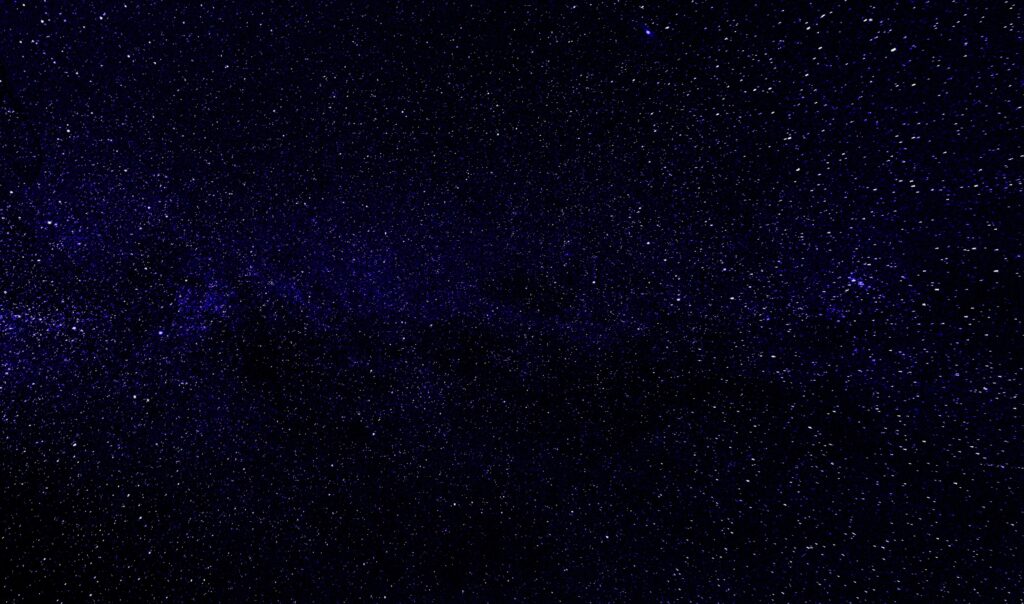Serene Starry Night Sky Wallpaper Background with Milky Way View