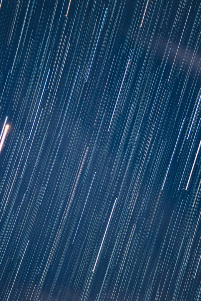 Mesmerizing Starry Sky Wallpaper: Long Exposure Light Streaks