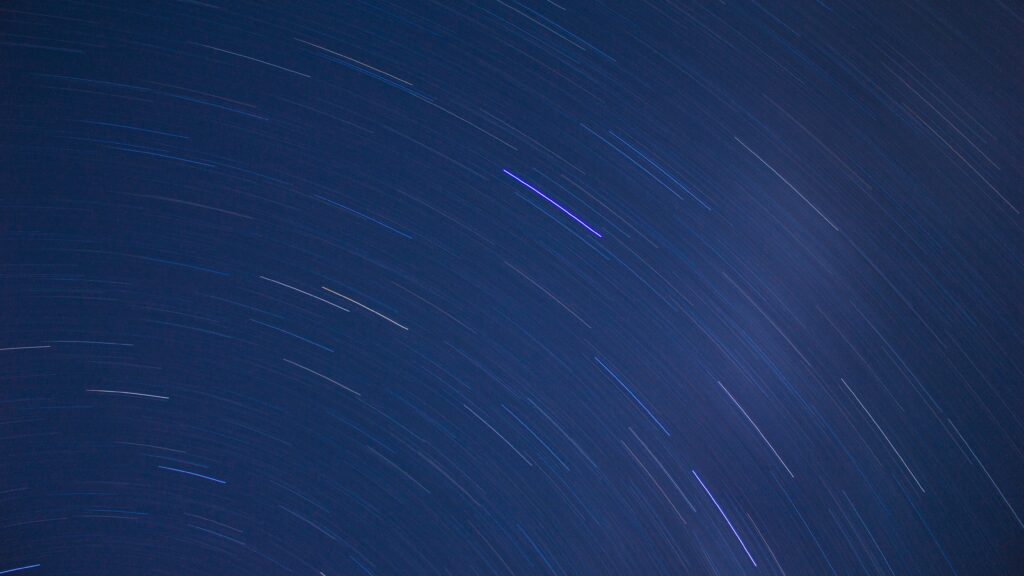 Mesmerizing Starry Sky Wallpaper with Light Streaks - 5184x2916