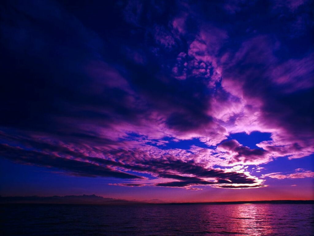 Mesmerizing Sunset over Sea HD Wallpaper - Purple & Orange Sky