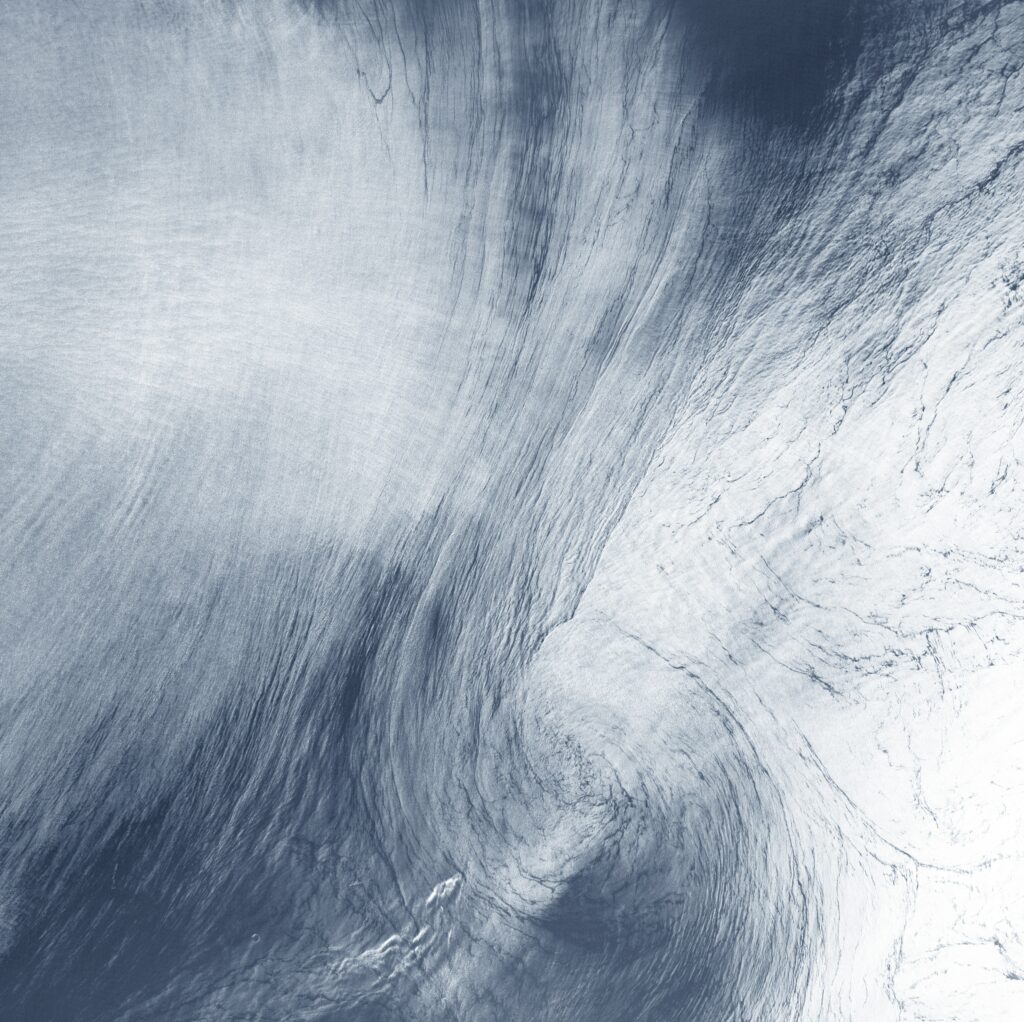 Mesmerizing Vortex Wallpaper: Ethereal Cloud Design for Cosmic Feel