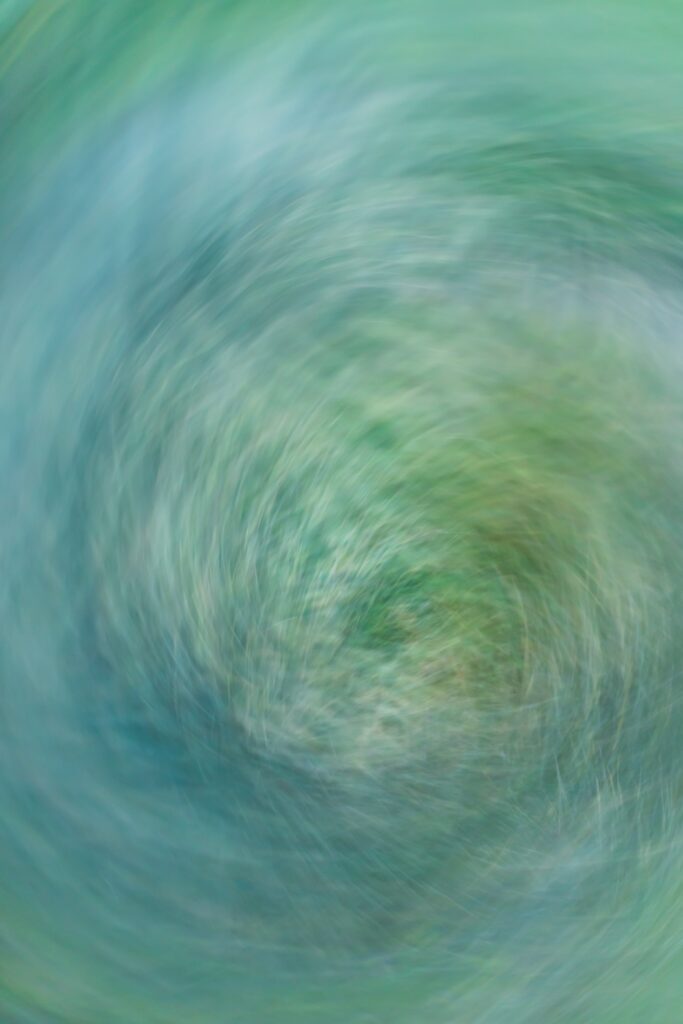 Mesmerizing Swirling Abstract Wallpaper in Green & Blue Hues
