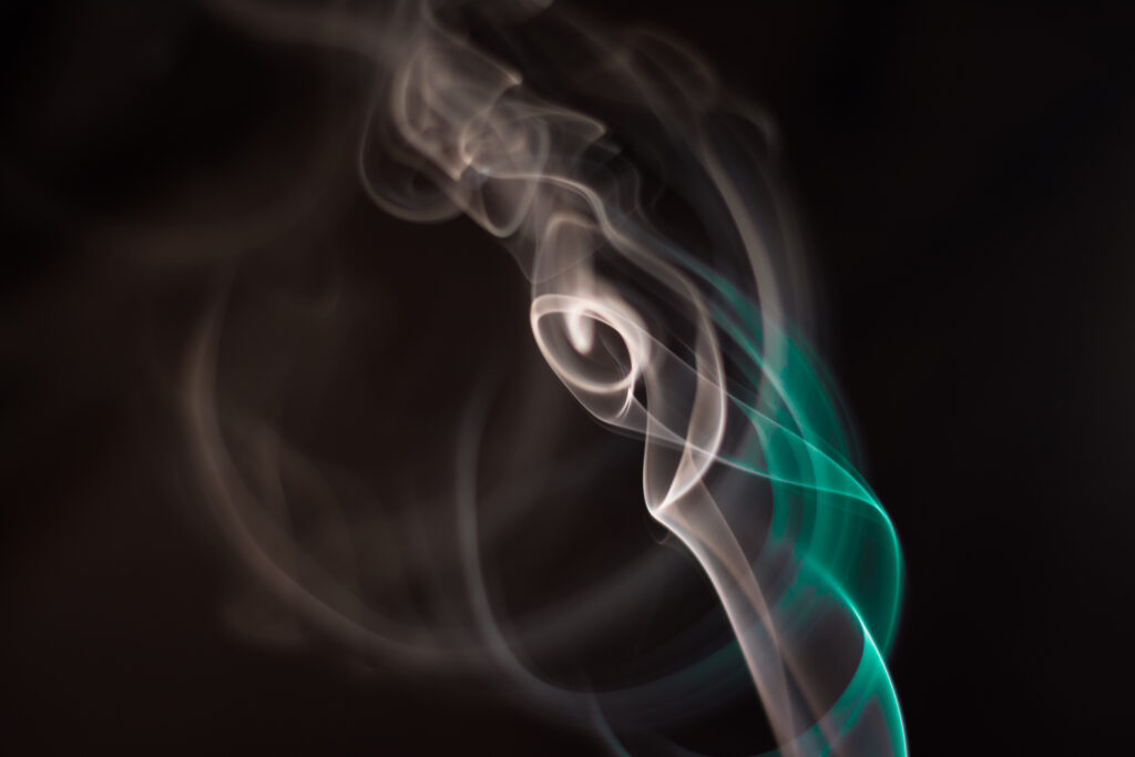 Mesmerizing Colored Smoke Wallpaper on Dark Background
