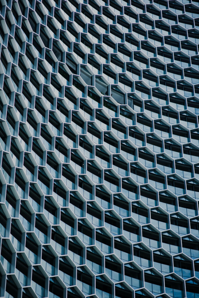 Intriguing Symmetrical Windows: A Captivating Background for Your Phone Wallpaper