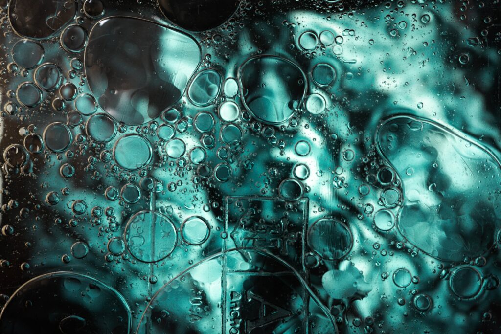 Mesmerizing Teal Abstract Wallpaper with Floating Bubbles & Circles