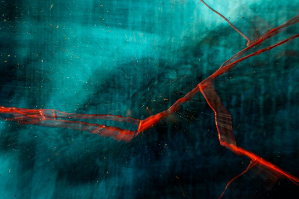 Dynamic Teal and Red Abstract Wallpaper with Painterly Textures