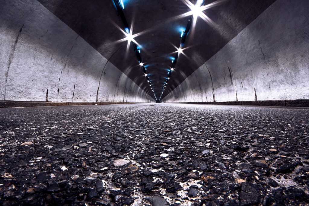 Futuristic Tunnel Road Wallpaper: Mesmerizing Nighttime View