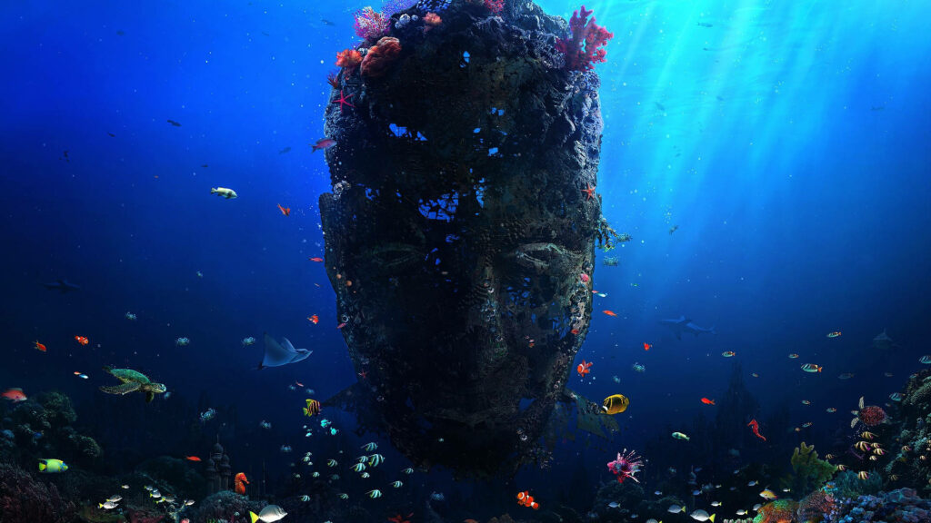 Stunning Underwater Coral Reef Wallpaper with Mysterious Statue