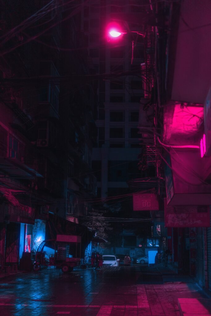Mesmerizing Nightscape: Neon-Lit Urban Alley Wallpaper