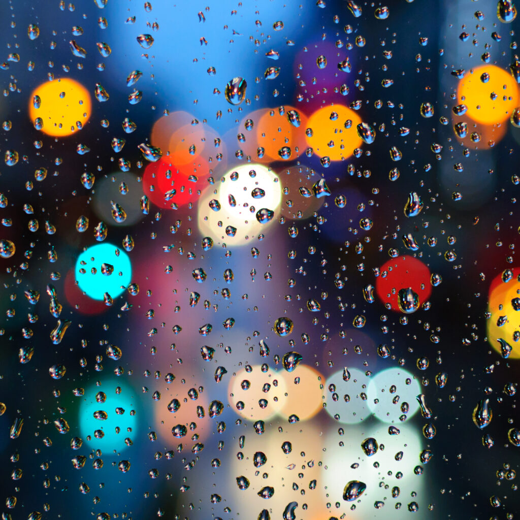 Stunning Water Drop Wallpaper with Colorful Bokeh Background