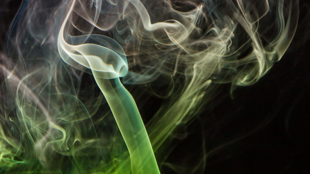 Swirling White & Green Smoke Wallpaper on Deep Black Background