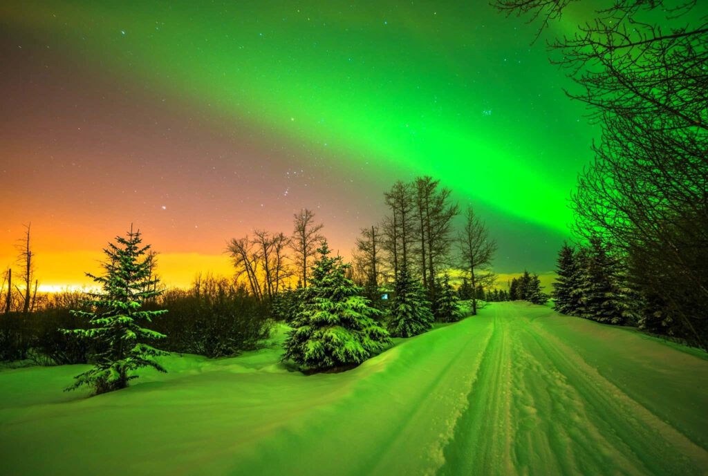 Mesmerizing Winter Landscape Wallpaper: Snow Trail & Northern Lights