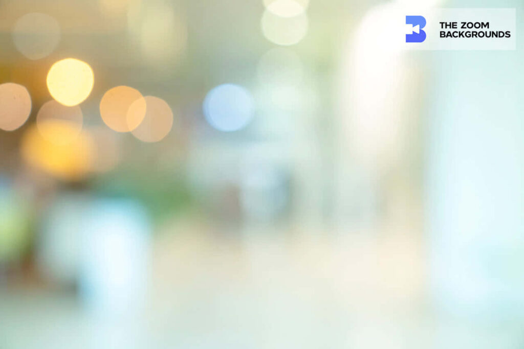 Minimalist Zoom background with soft bokeh yellow light orbs and cool blue tones for video calls Wallpaper