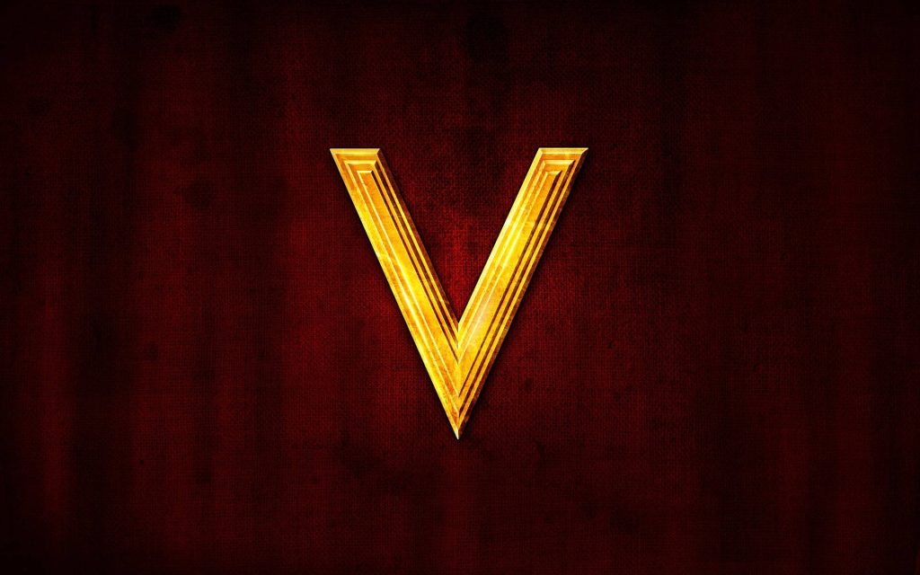Metallic 3D golden letter V on dark red textured background elegant digital wallpaper
