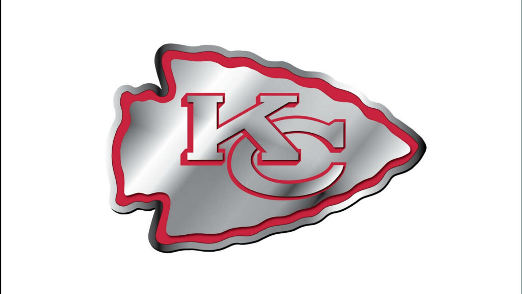 Metallic Kansas City Chiefs logo wallpaper with shiny silver arrowhead and bold red outline on white