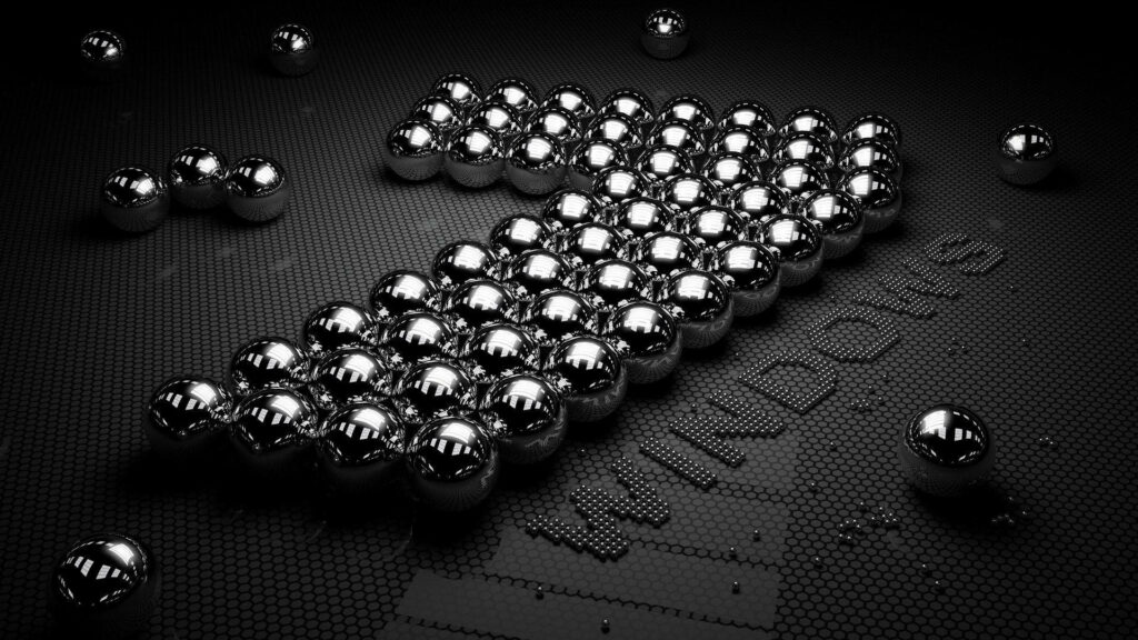 Industrial Elegance: Metal Ball Art Composes Mysterious Windows 7 Wallpaper on Honeycomb Canvas