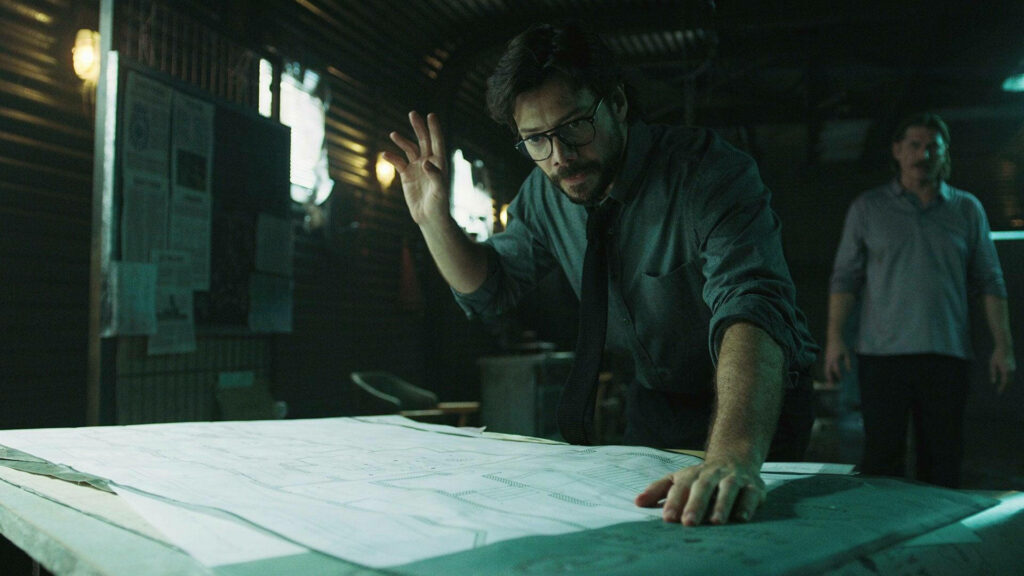 The Sharp Mind of a Mastermind: Professor Strategizes in the Dark Secrets of the Money Heist Hideout Wallpaper