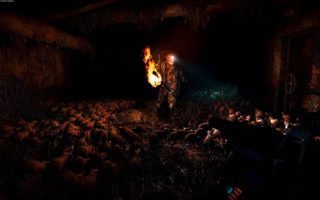 Metro Last Light Artyom with torch fights rats in dark claustrophobic survival horror tunnel wallpaper