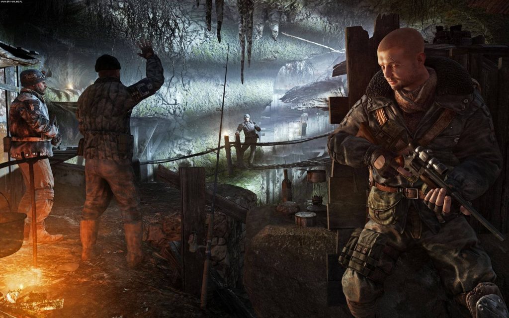 Armed soldier guards Metro Last Light tunnel as comrades warm by fire in dark post-apocalyptic cave Wallpaper