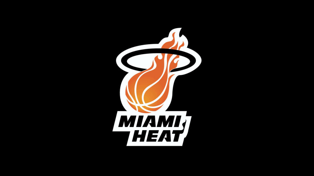 Miami Heat logo with flaming basketball dunking through hoop on sleek black background wallpaper