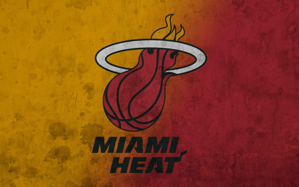 Miami Heat logo with fiery basketball on yellow red watercolor background dynamic wallpaper