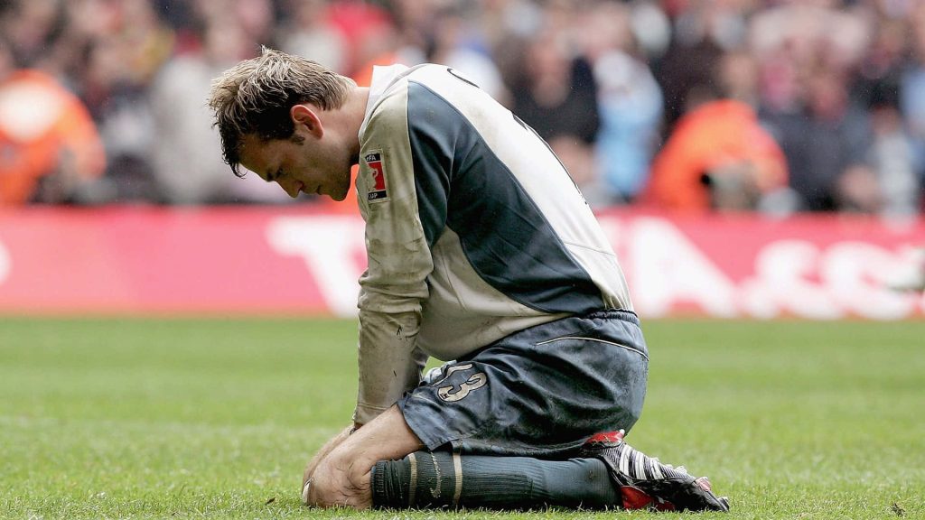 Michael Ballack kneeling on pitch in Chelsea FA Cup kit emotional football moment wallpaper