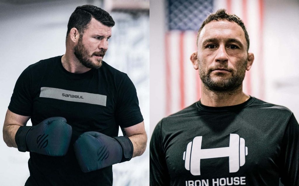 MMA icons Michael Bisping and Frankie Edgar intense combat training gym wallpaper background