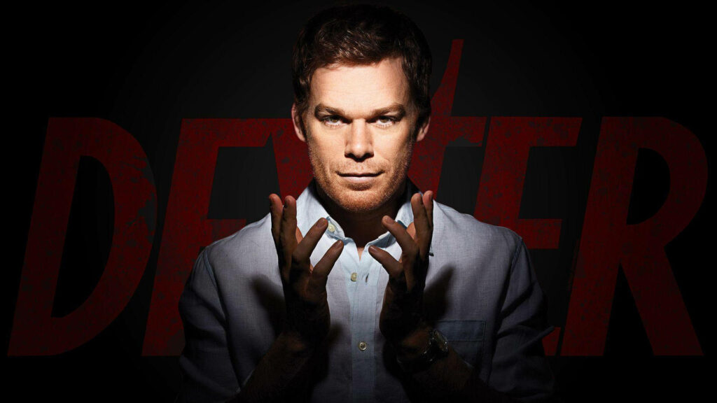 Michael C Hall as Dexter Morgan in spotlight with intense gaze and red Dexter title background Wallpaper