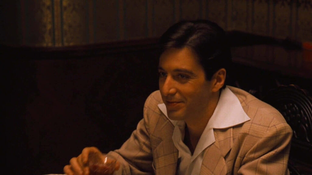 Michael Corleone Smiling: Iconic Godfather Wallpaper Background